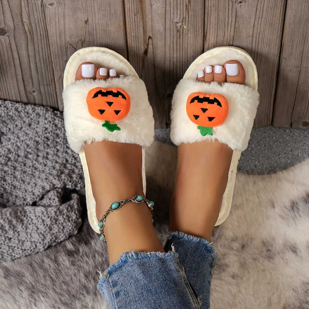 Pumpkin plush slippers with cartoon design, synthetic fur upper and PVC sole
