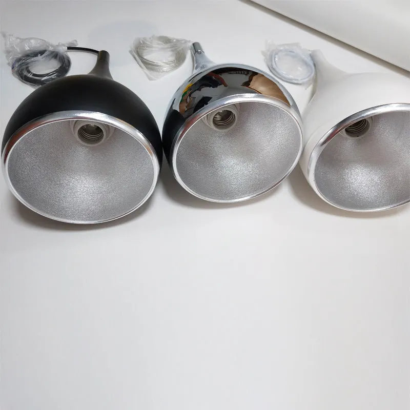 Minimalist iron pendant chandelier with single head or three-head disc and long plate options in black, white, or chrome finish.