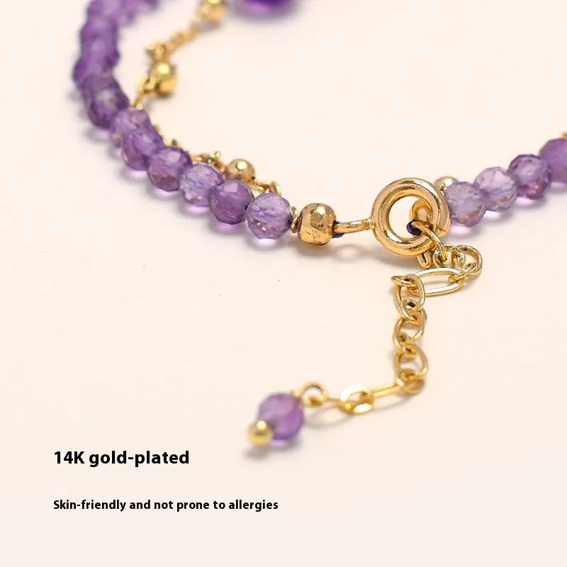 Chinese-style women's bracelet featuring genuine crystal and pearl beads with amethyst purple electroplated finish