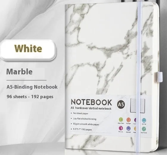 A5 soft touch PU leather strap diary open showing lined pages, closed with elastic band, in a choice of colours.