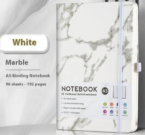 A5 soft touch PU leather strap diary open showing lined pages, closed with elastic band, in a choice of colours.