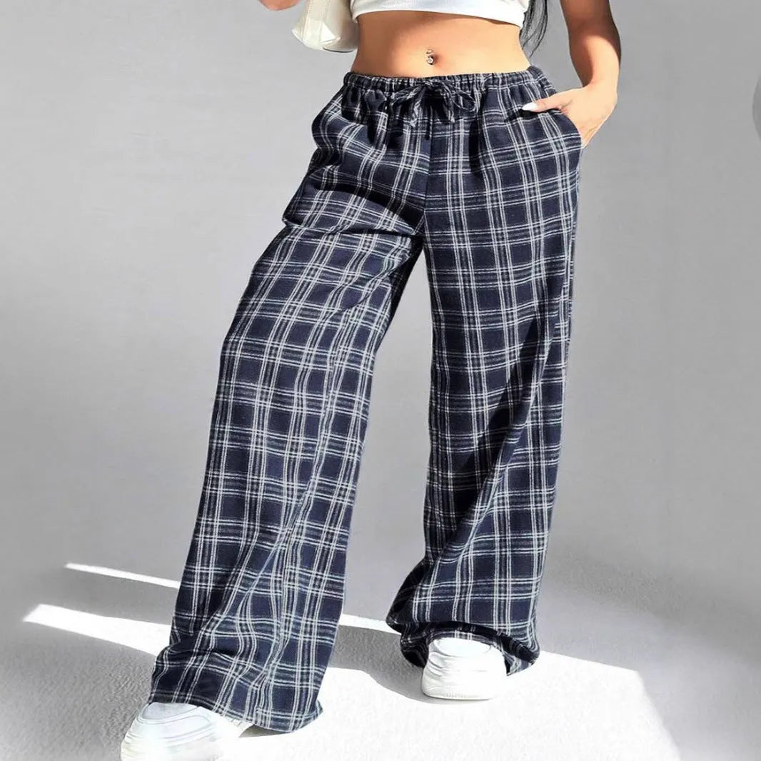 Women's plaid pattern casual trousers with loose fit, drawstring waist, and functional pockets