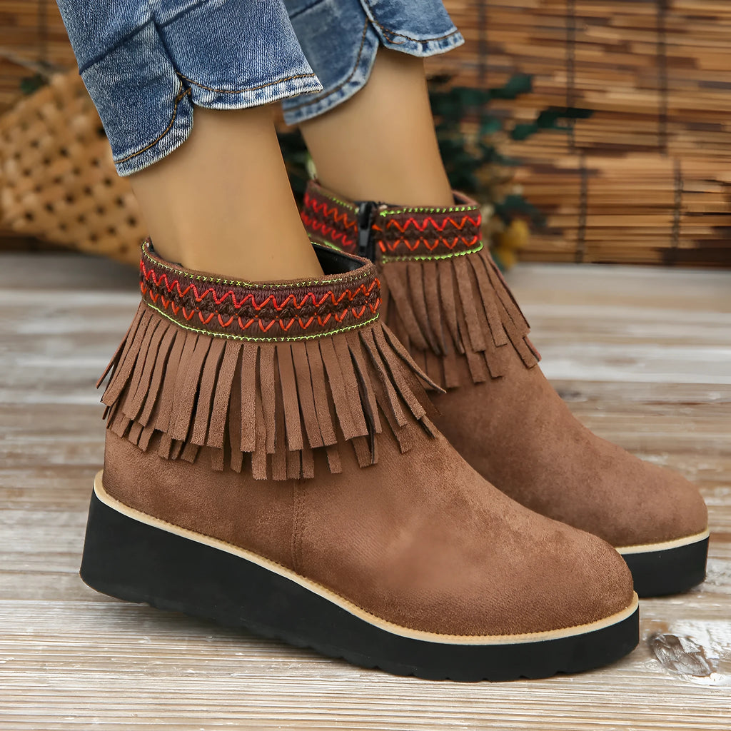 Women's suede wedge ankle boot with thick rubber sole and side zip in black, blue, or dark brown
