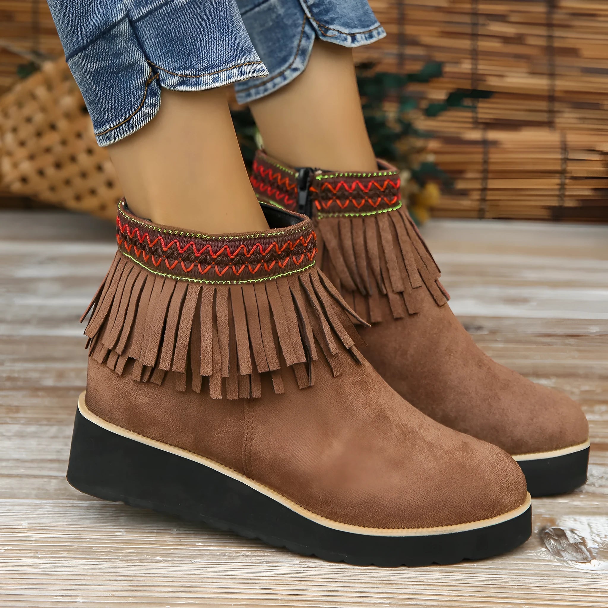 Women's suede wedge ankle boot with thick rubber sole and side zip in black, blue, or dark brown