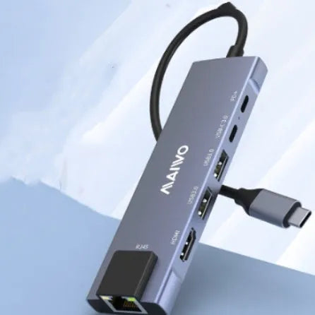 Aluminium Steam Deck docking station with six ports including HDMI, Ethernet, and USB, shown with a 15cm cable