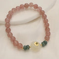 Women's strawberry quartz bracelet with blue water emerald round jade pendant, geometric diamond design with Ruyi and peace buckle elements