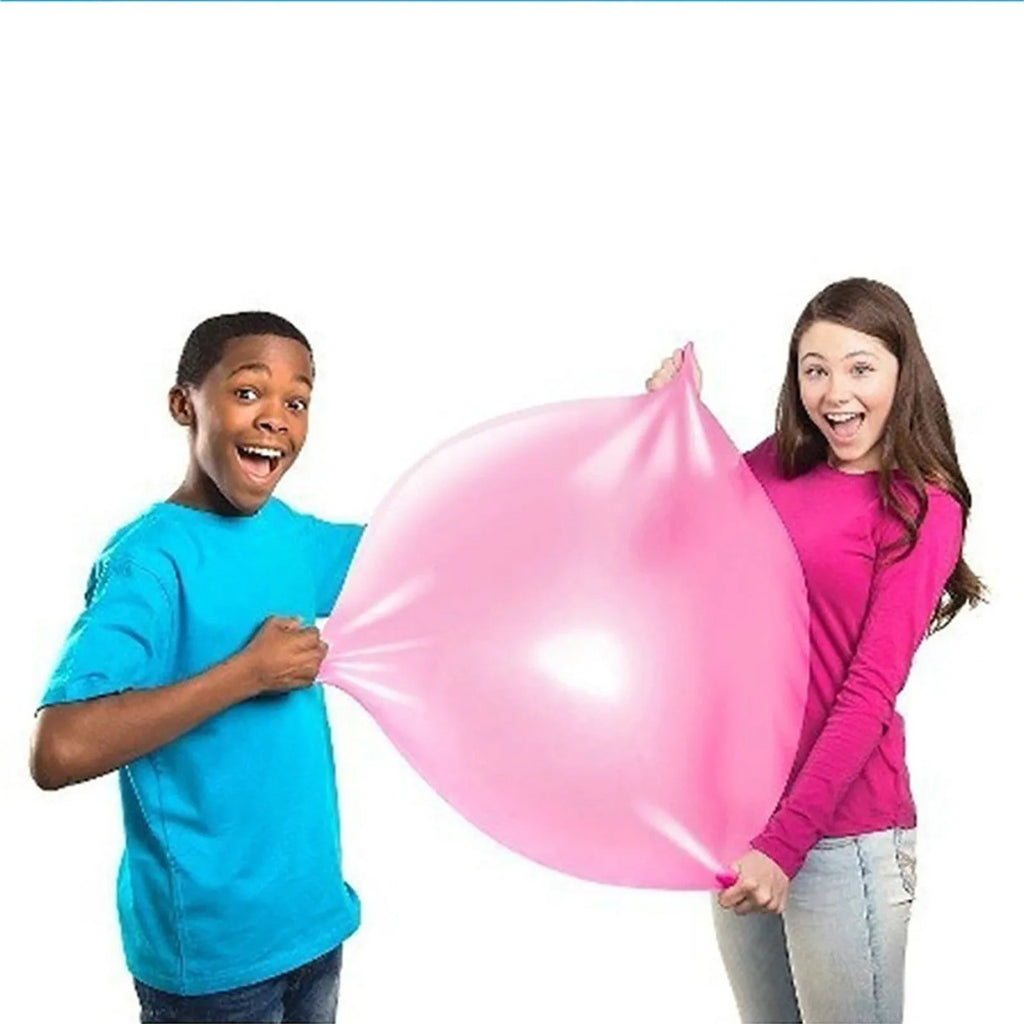 Large pink, yellow, green, and blue inflatable TPR bouncy balls in different sizes.