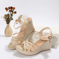 Women's wedge sandals with fish mouth toe design in black cloth upper