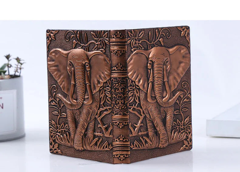 PU leather embossed retro notebook with Bronze relief cover showing beige inner pages