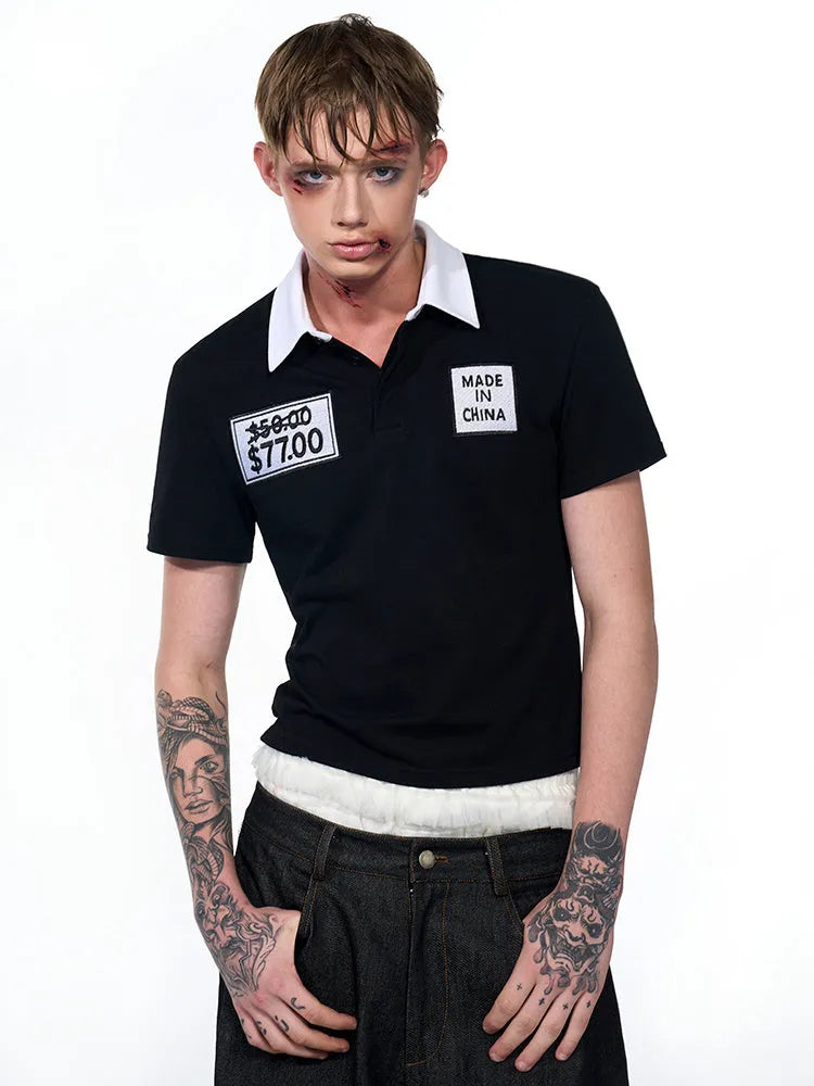 Black slim fit men's short sleeve polo shirt with embroidery detail on the front.