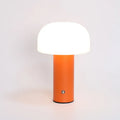 USB-powered plastic table lamp in choice of black, green, orange, or white colours.