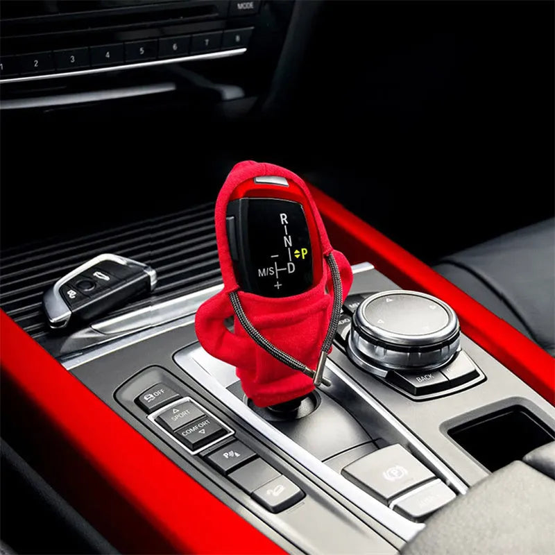 Universal 12cm pure cotton gear knob cover in hoodie style with adjustable drawcord, shown in black