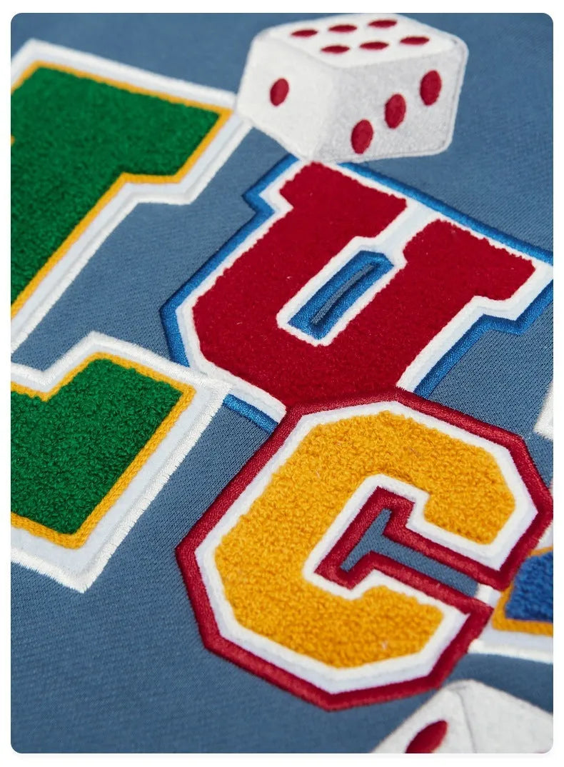 Blue varsity baseball uniform jacket with stand-up collar, single-breasted front, and loose fit, sizes S to XL