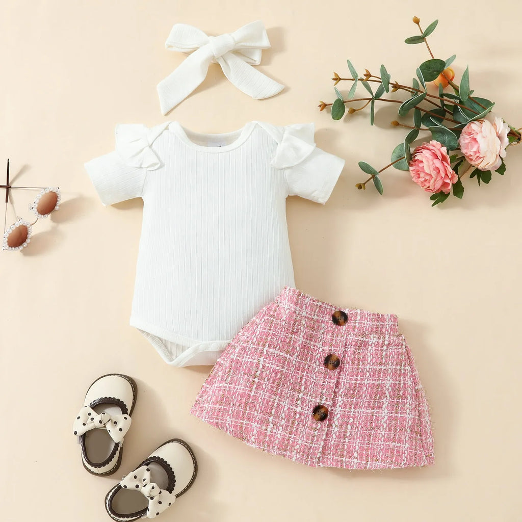 Babies' short-sleeved blouse skirt suit in black with plaid pattern, including romper, skirt and hairband
