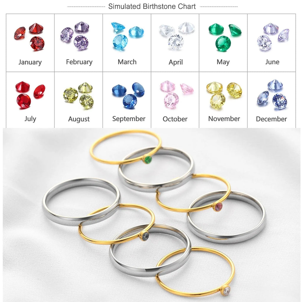 Titanium steel engraved ring with a December colour birthstone and geometric design.