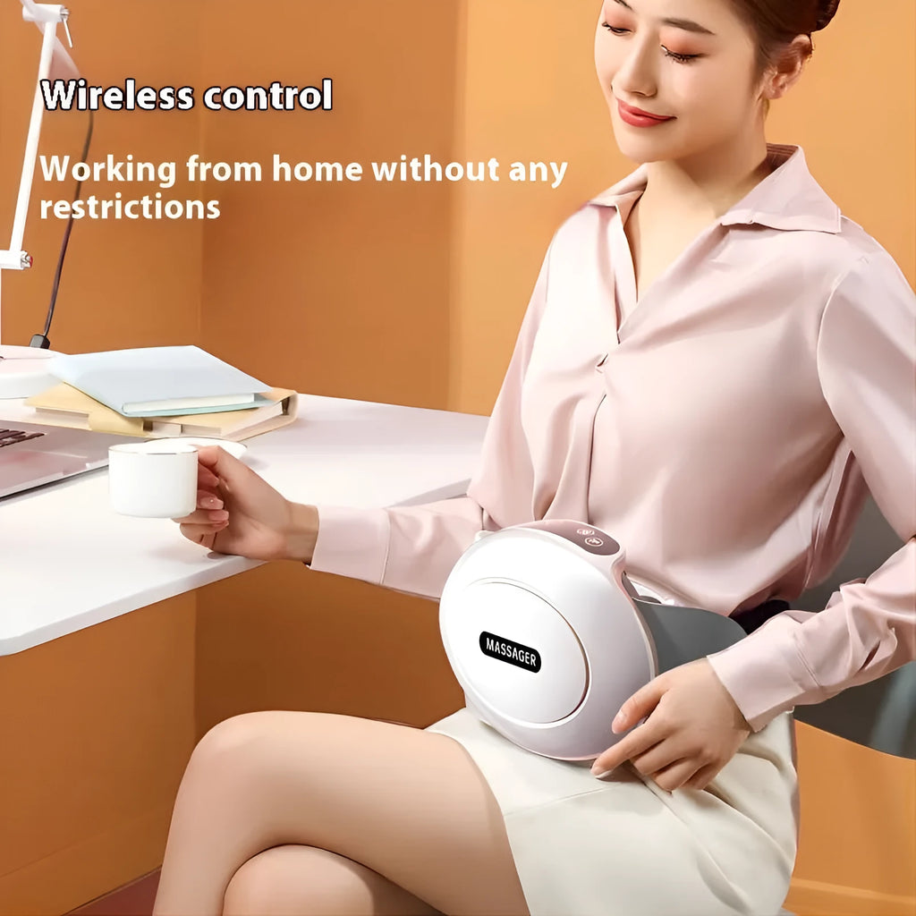 White portable abdominal massager with touch controls on a table