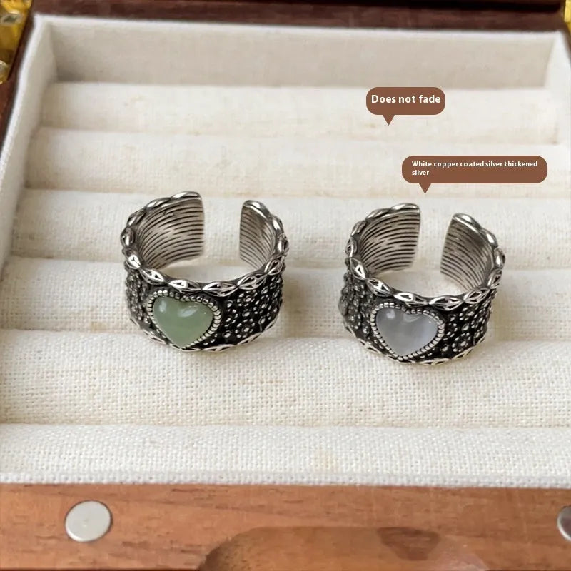 Retro style adjustable silver ring with a large heart shape and moon design in white or green colour.