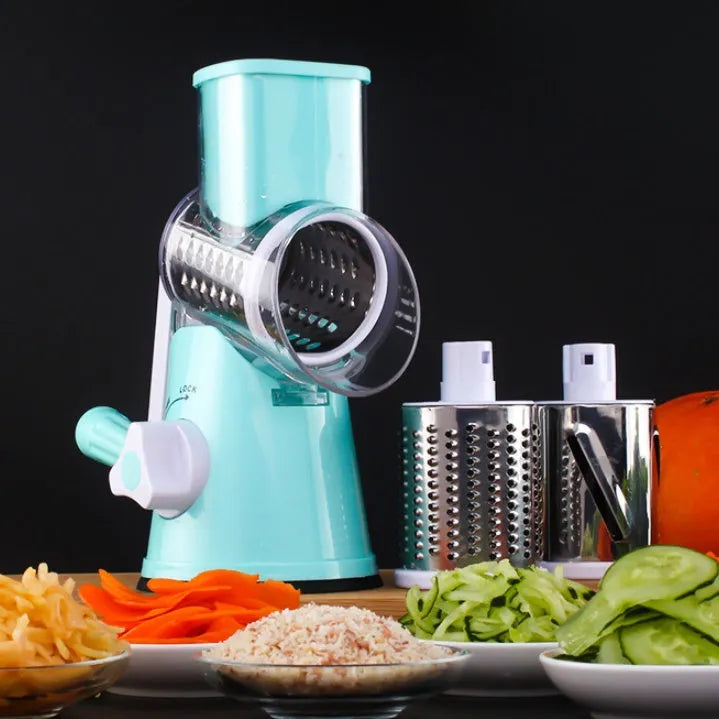 Blue round manual mandoline kitchen slicer with stainless steel blade on a countertop.