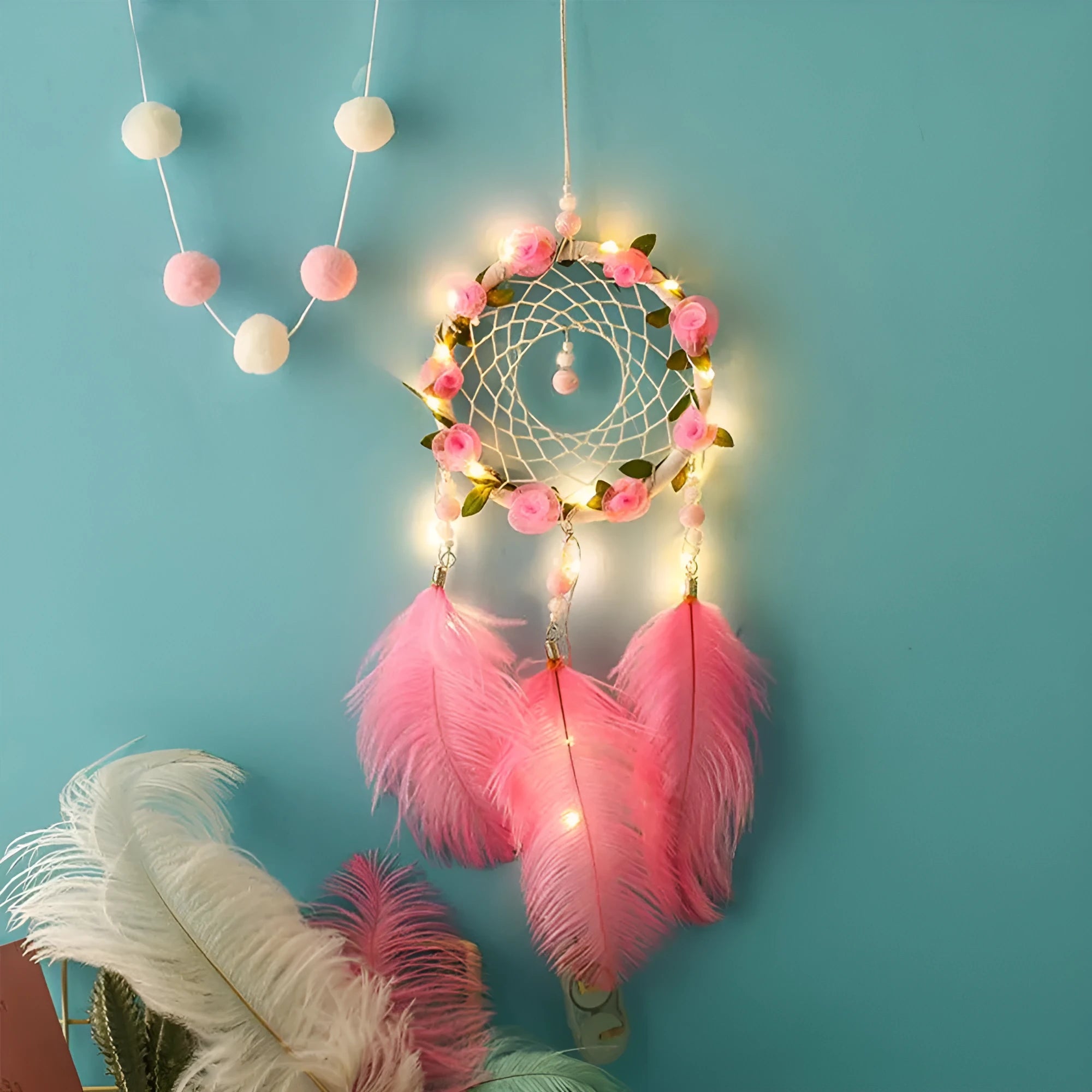 Pink ostrich feather dreamcatcher wind chime wall ornament measuring 10cm