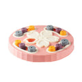 Blue interactive slow feeder dog bowl with puzzle channels, 28 cm diameter, on a wooden floor.