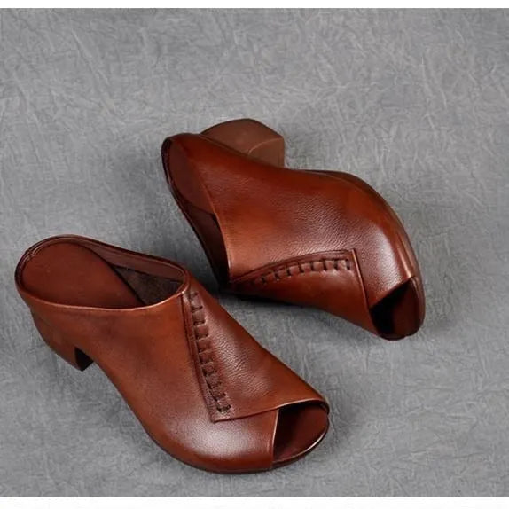 Women's black square heel peep-toe slippers with a fish mouth vamp design on a white background.