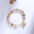 Women's crystal bracelet with coloured hair crystal and red sealant flower shell design