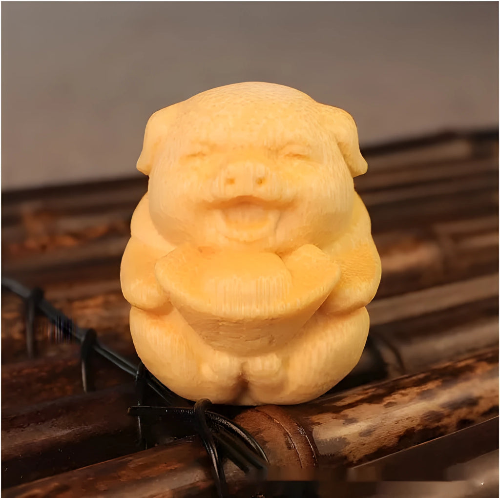 Solid bamboo carving ornament of cute pig figure measuring 4cm tall by 3.5cm diameter