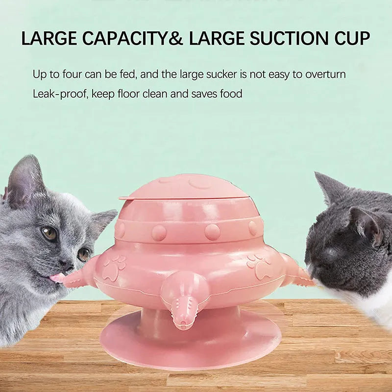 Pink silicone pet nursing bottle with four teats and a flat base.
