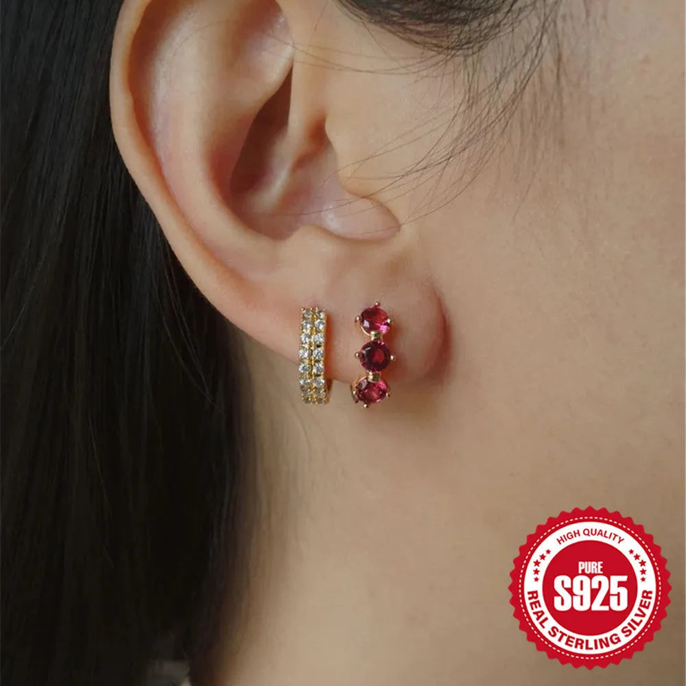 Golden S925 sterling silver earrings with geometric sunflower design and inlaid zircon stones.