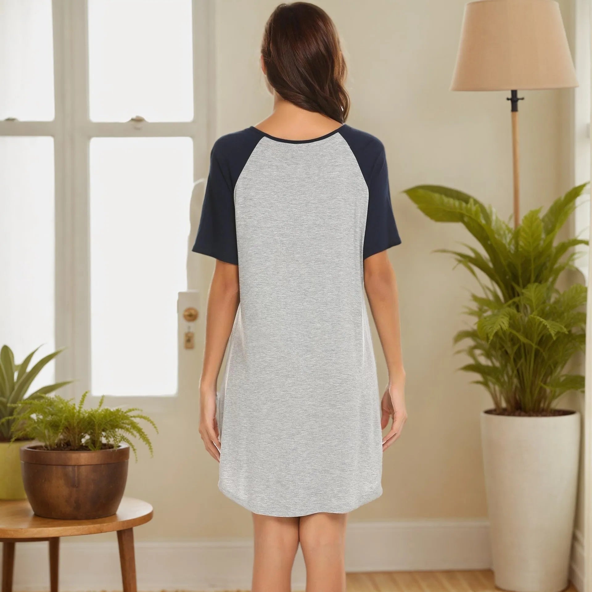 Women's double brushed nightdress with navy blue sleeves on a light grey body, or black sleeves on a dark grey body.