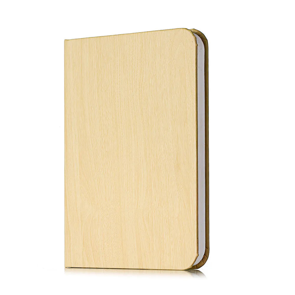 Wooden LED boy lamp in three colour options showing modern design and battery power
