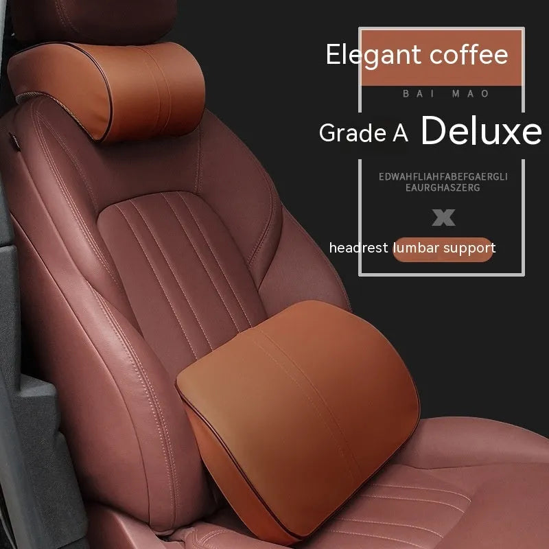 Car seat cushion headrest with memory foam interior and leather exterior in solid colour