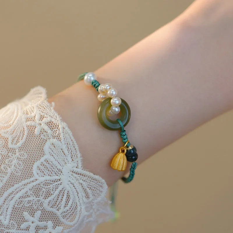 Hand-woven flexible wire watch band with Pearl Peace Buckle and round jade pearl decoration