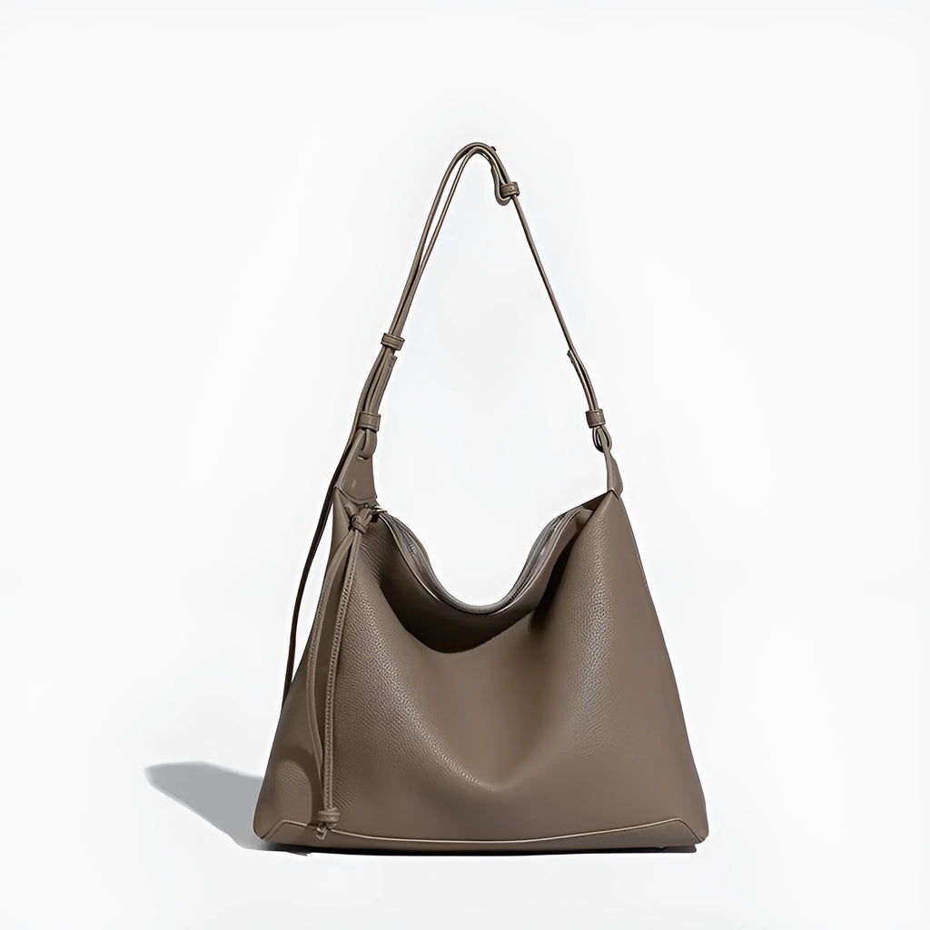 Soft PU messenger bag in caramel colour showing 36cm length and underarm shoulder strap
