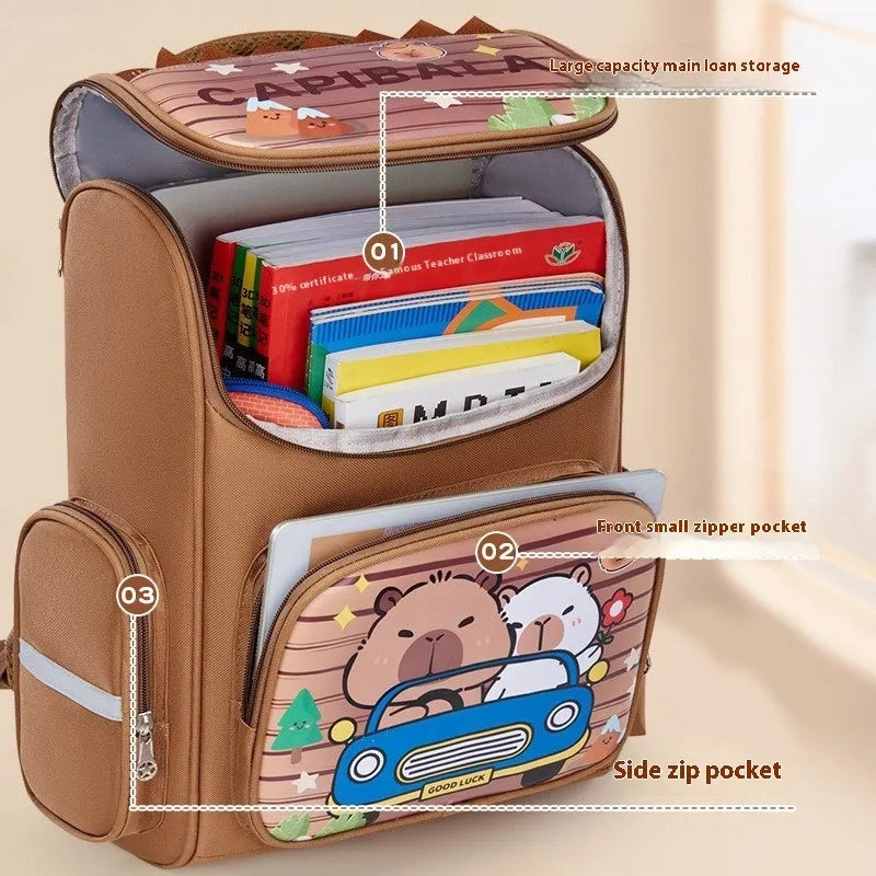 Capabala large capacity primary school bag with cartoon print, waterproof fabric, and air pillow belt in brown, blue, pink, or purple