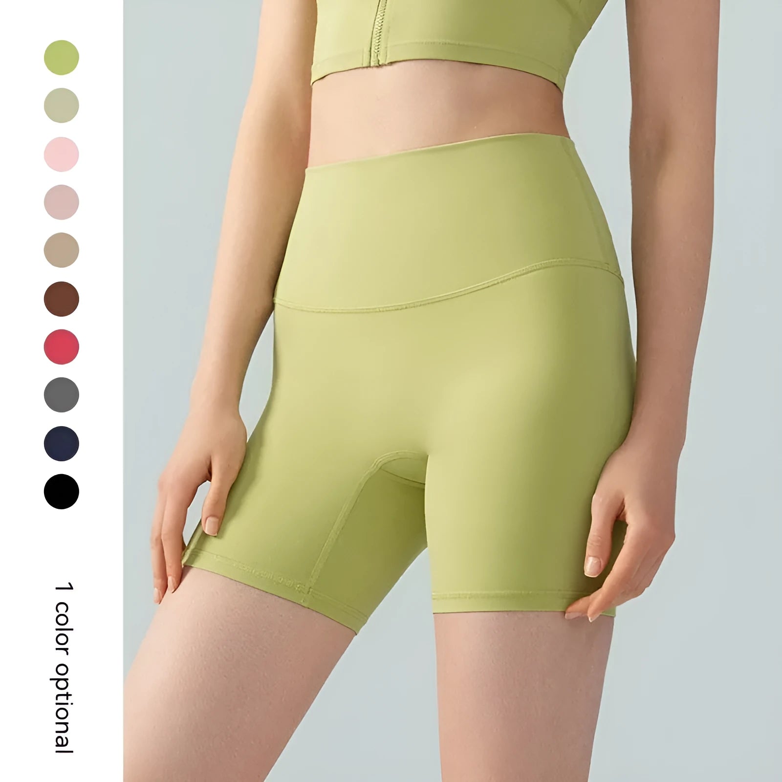 Woman wearing leaf green high waist Lycra yoga shorts for fitness exercise.