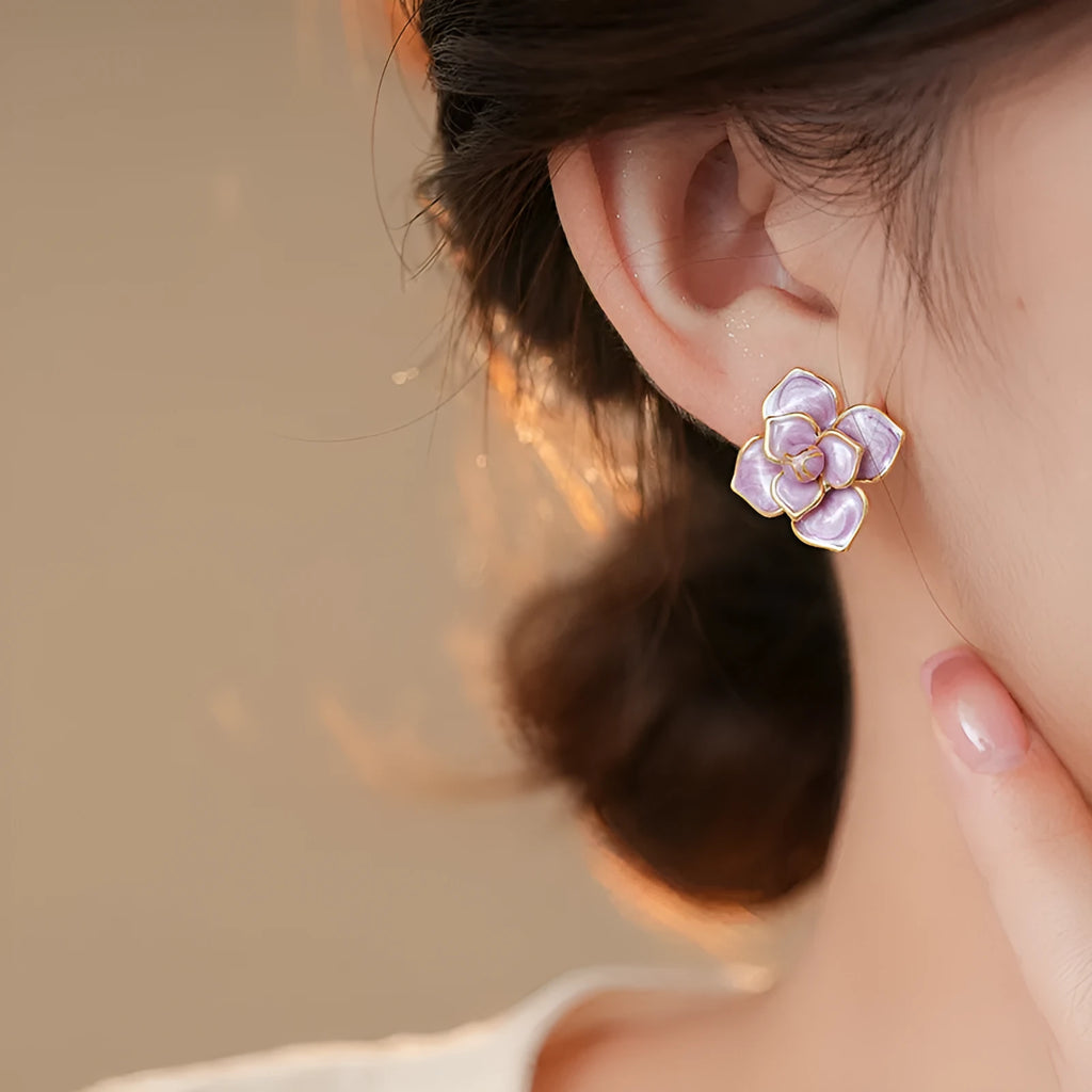 Golden-purple oil-spot glaze flower stud earrings with gold-plated silver needle detail on copper.