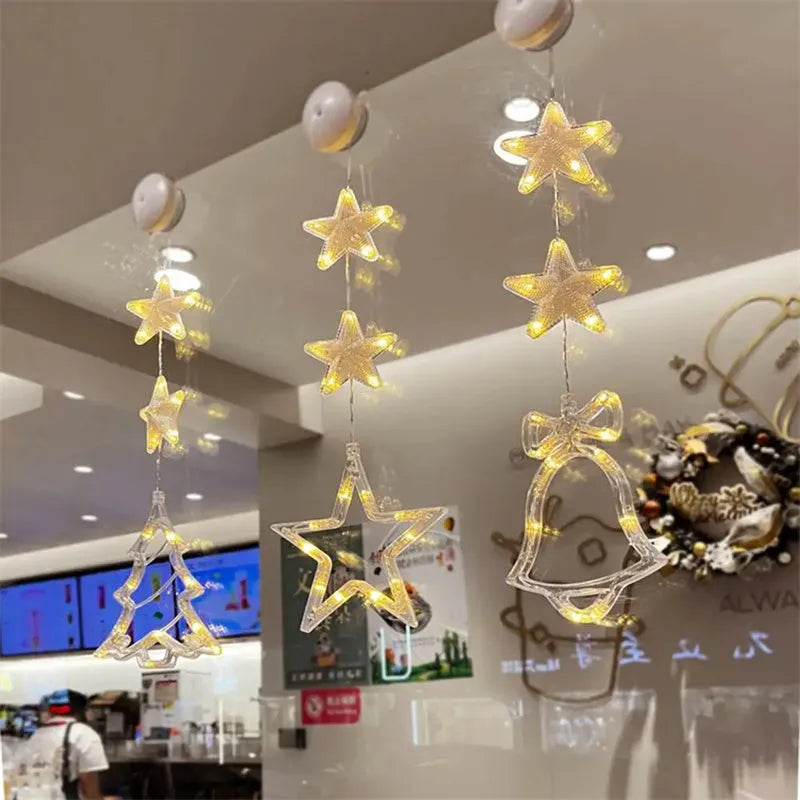 Christmas LED window decorations with suction cups showing star, tree, and deer pendant designs