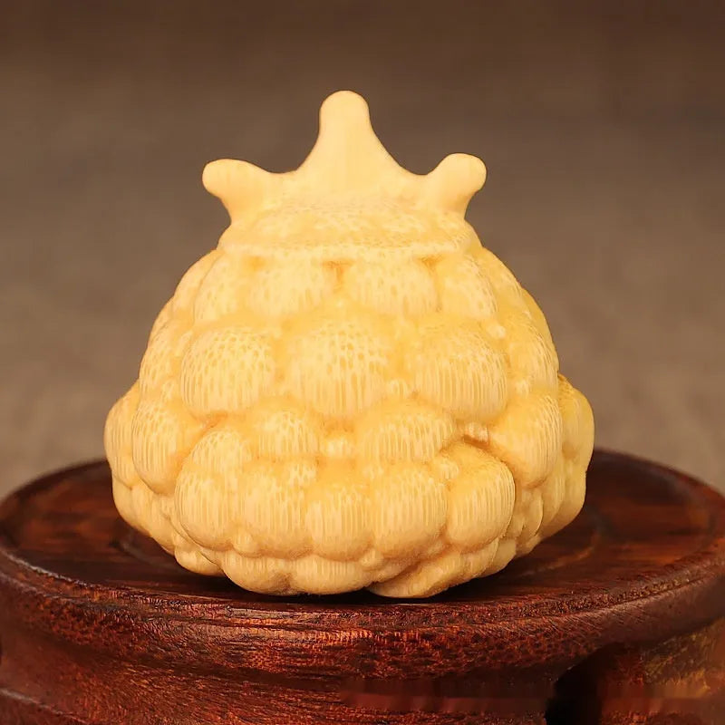 Solid bamboo carving of a cute Crown Princess Toad figurine, 5 cm in size.