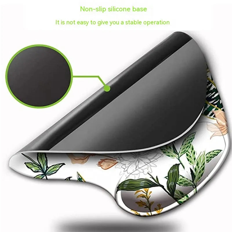 Black silicone keyboard pad with wrist strap and floral pattern, rubber sole visible underside