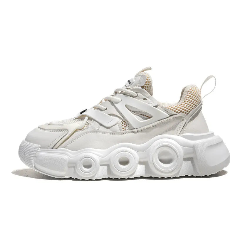 Men's low-top sneakers in black with breathable mesh upper, thick rubber sole, and round toe lace-up design.