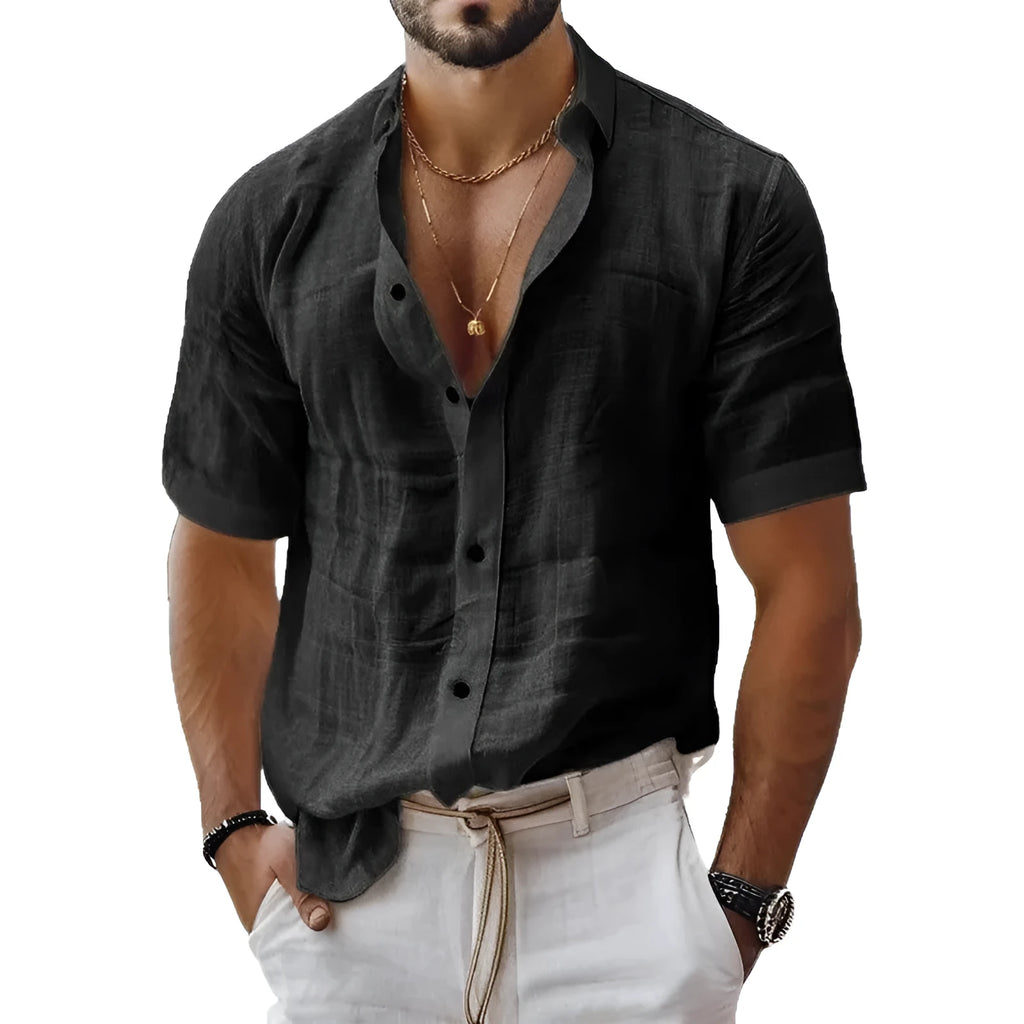 Men's solid colour short sleeve lapel shirt in light green shown on a hanger