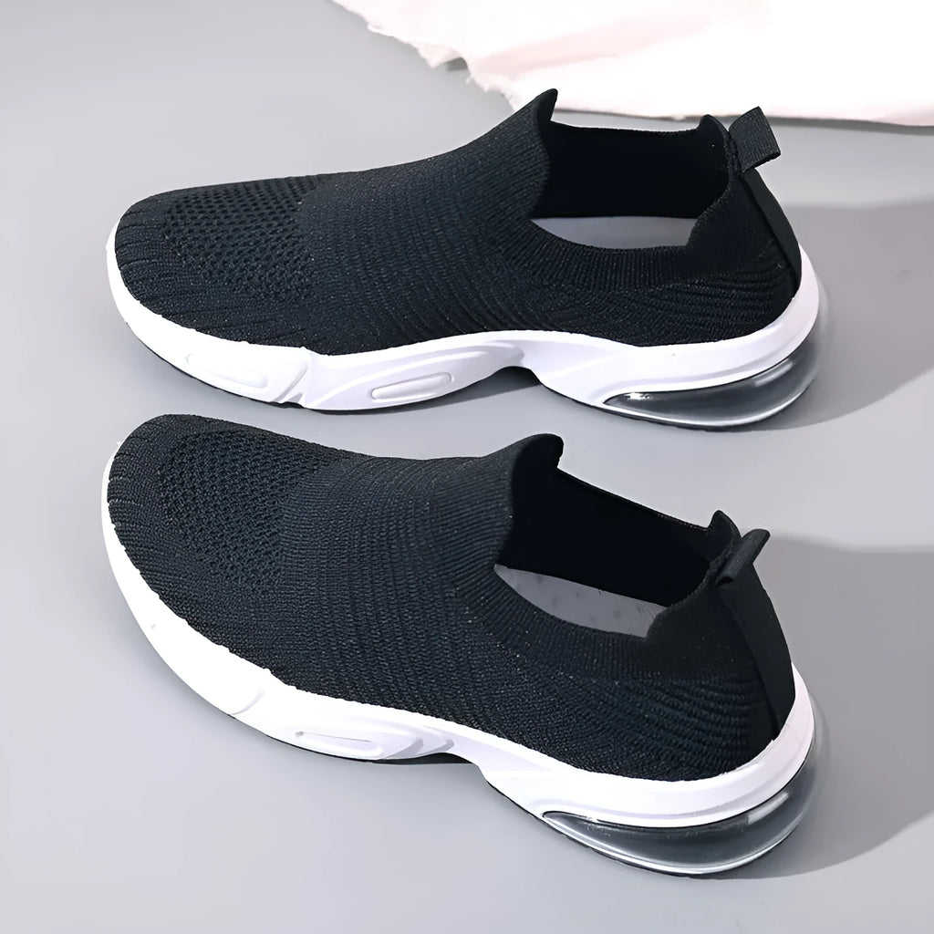Slip-on breathable sock shoes in black, pink, khaki, and white with mesh lining and PVC sole.