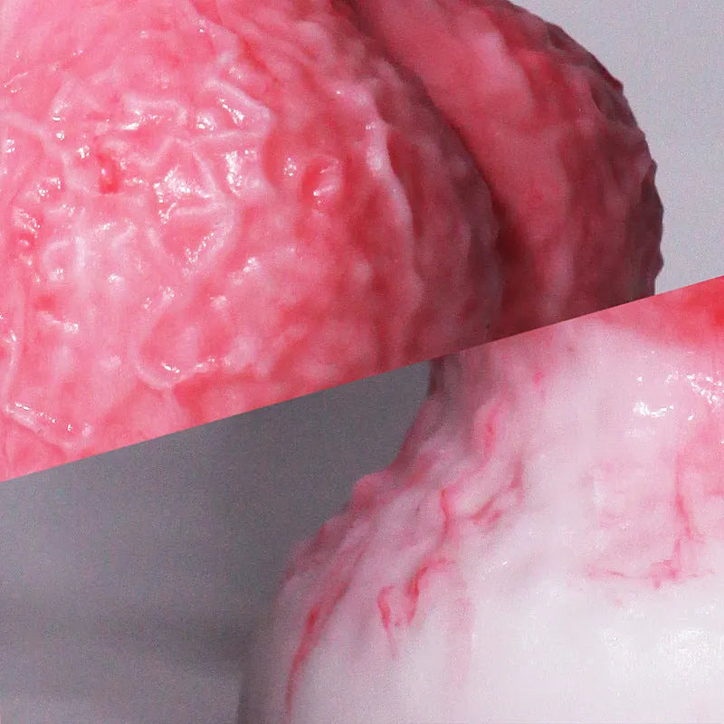 Pink platinum silicone penis-shaped masturbation device for women, shown in Berserker S and M sizes.