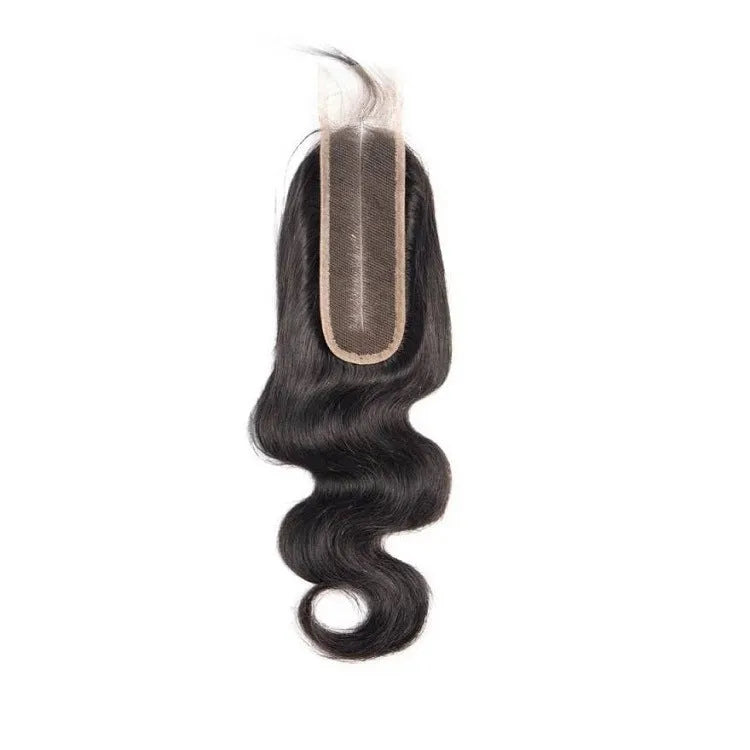 Straight natural colour human hair wig displayed on a stand, showing its length and exotic style.