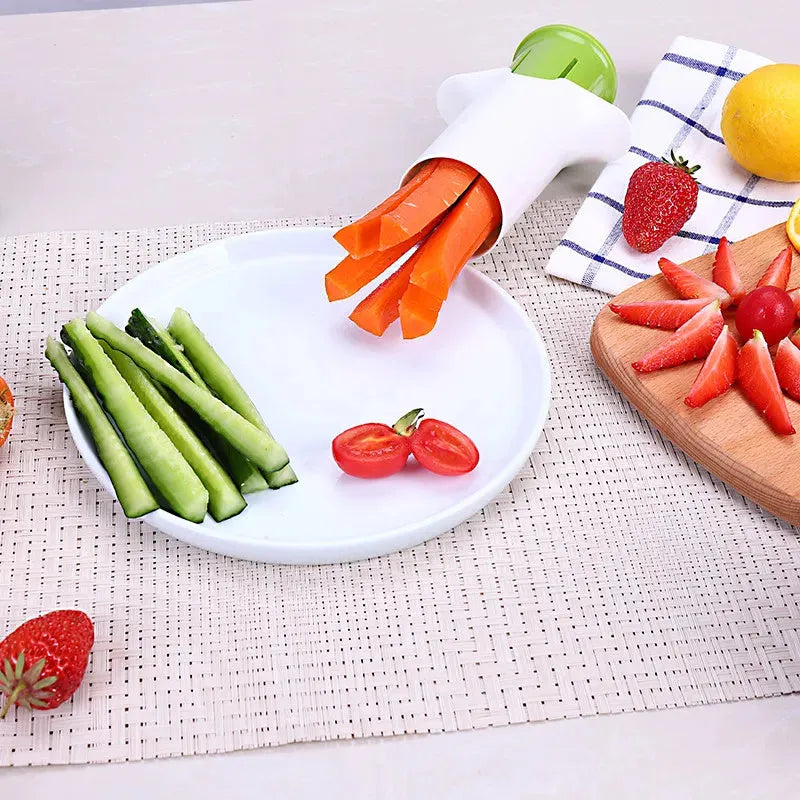 White ABS plastic vegetable slicer with stainless steel blades for cucumbers, carrots, and strawberries