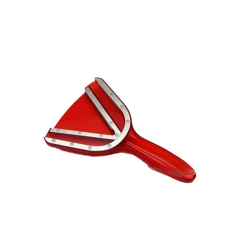 Red plastic telescopic can and bottle opener with non-slip handle on a kitchen counter.