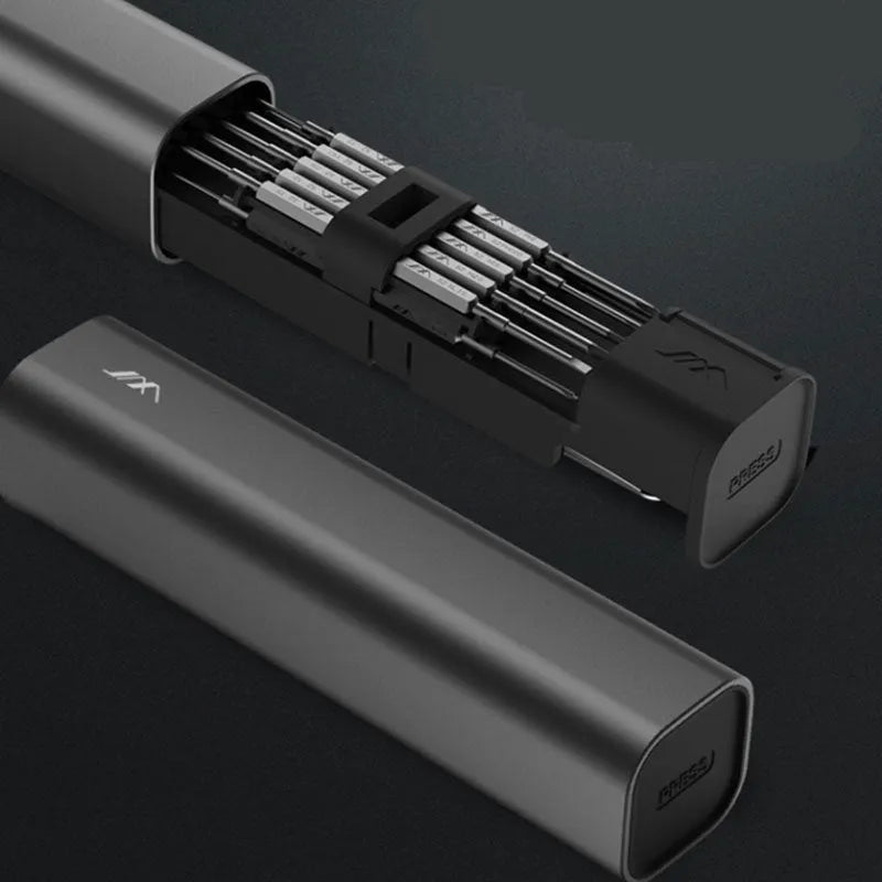 Black multi-function screwdriver set in aluminium tube with magnetic insulated bits for phone and home repair