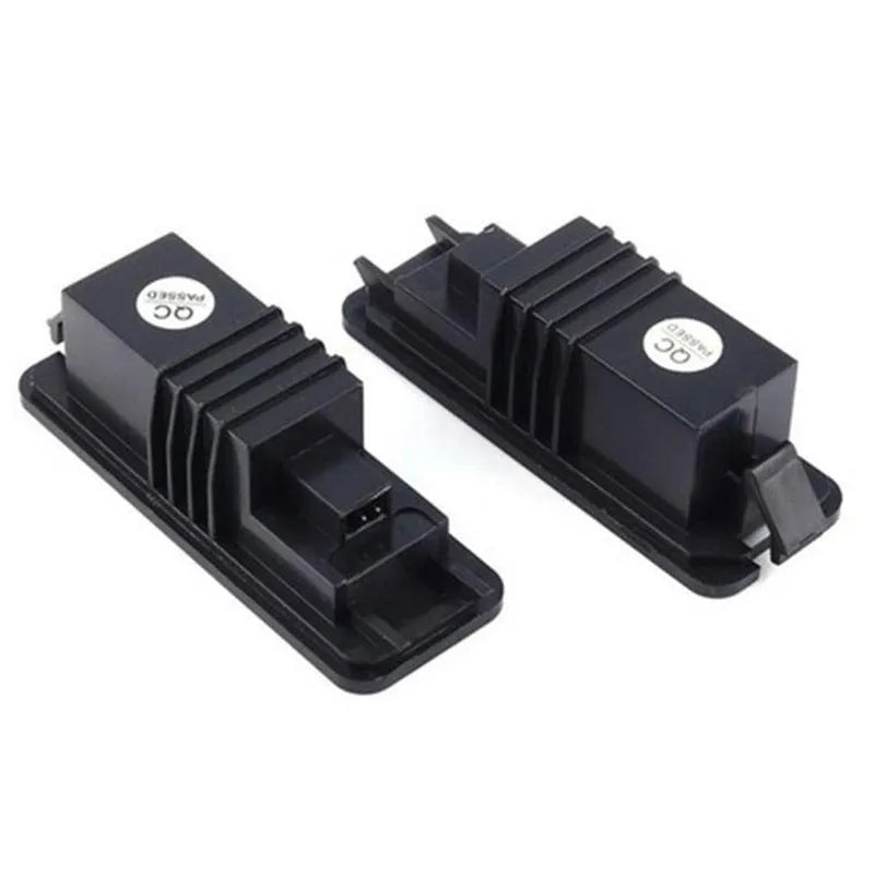 Two Volkswagen LED license plate light bulbs with SMD LEDs and plug connectors.