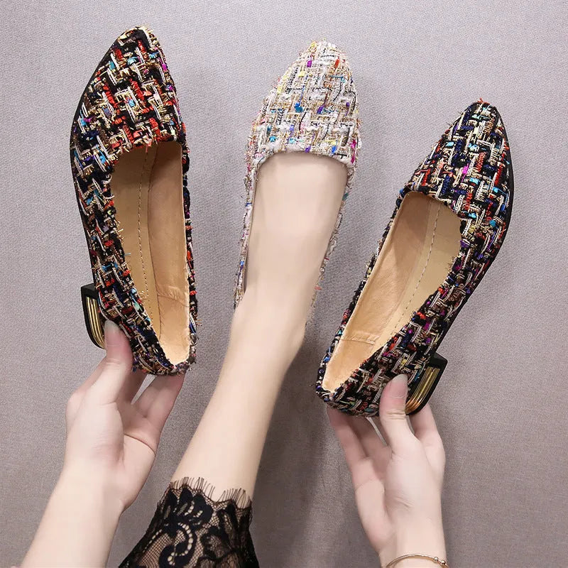 Women's black pointed-toe canvas casual shoes with flat rubber sole